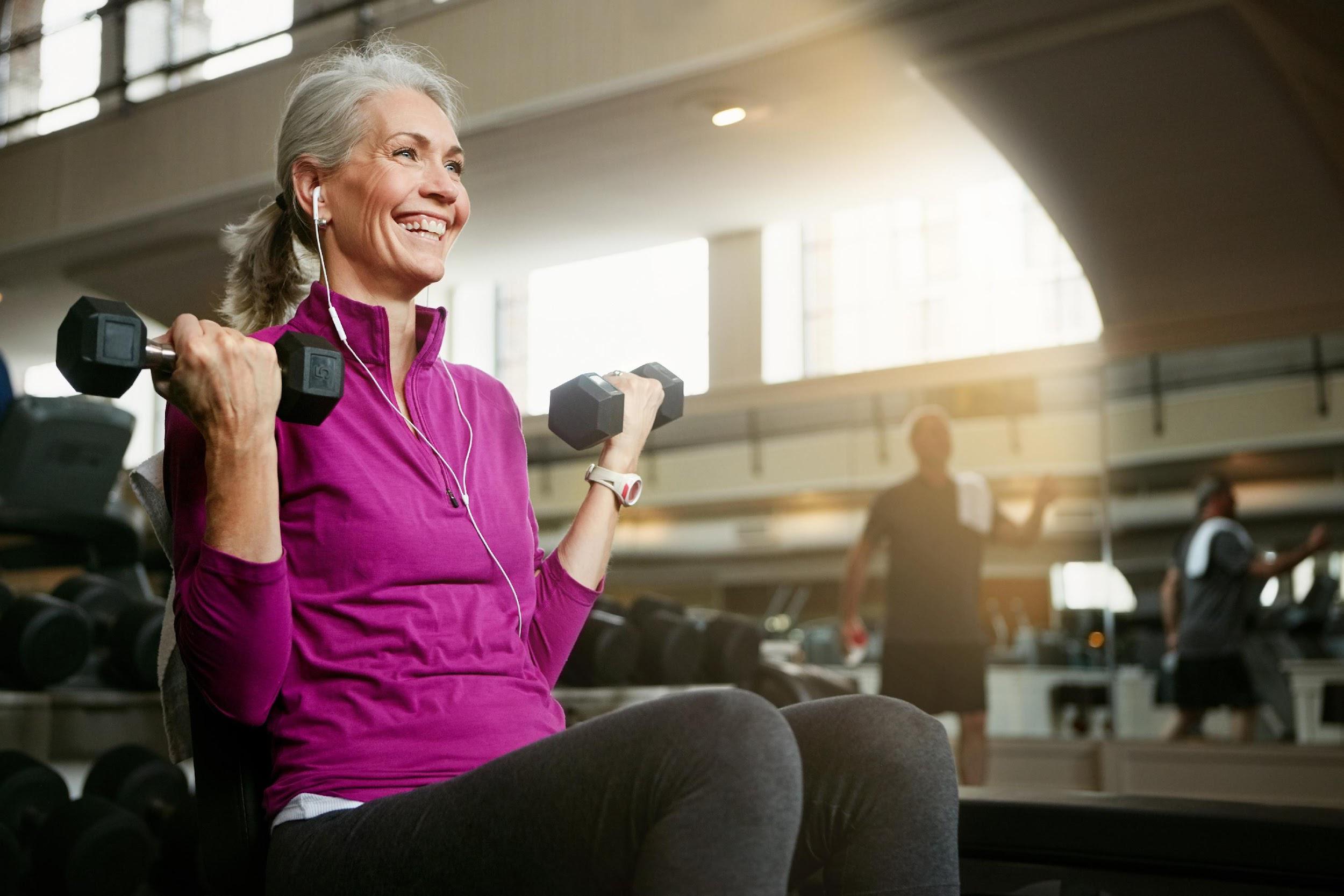 older woman lifting weights